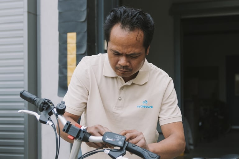 Man Fixing E-bike brakes